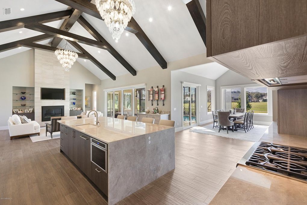 These stunning vaulted ceilings add a cozy touch to this modern Florida interior design project