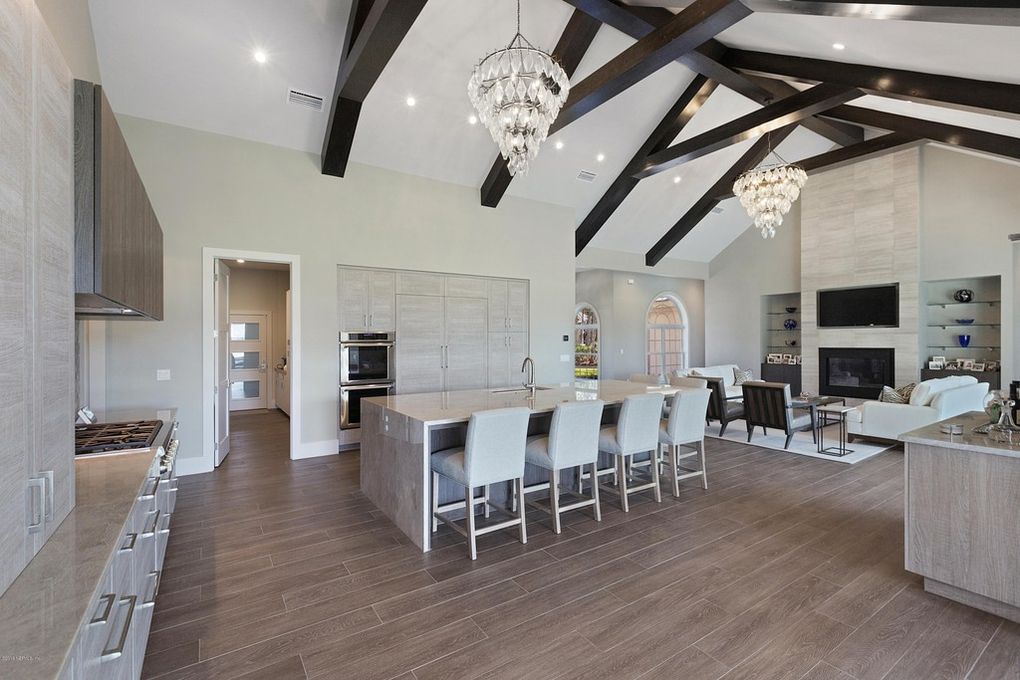 Ponte Verdra Beach vacation home features light airy colors with vaulted ceilings to bring charm to this modern Florida interior design